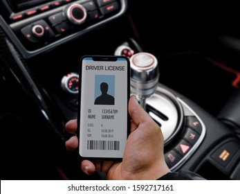 The Hand Grab A Mobile Driver Licence In The Car