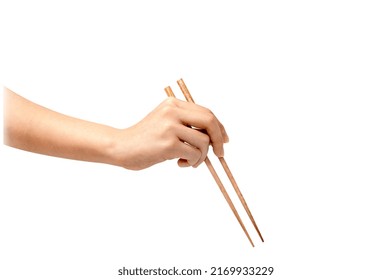 hand grabbing wooden chopstick asia culture restaurant