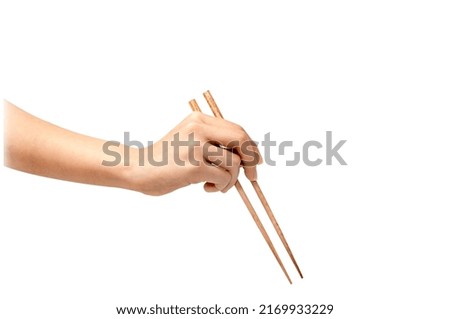 hand grabbing wooden chopstick asia culture restaurant
