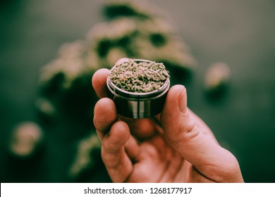 Hand Grinder Grind Marijuana Weed Against Stock Photo 1268177917