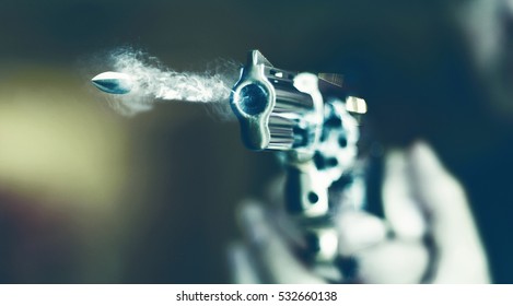 Hand Gun Revolver With Flying Bullet Fire