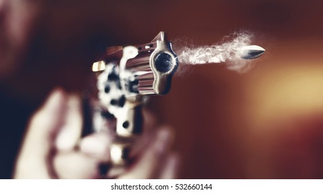 Hand Gun Revolver With Flying Bullet Fire