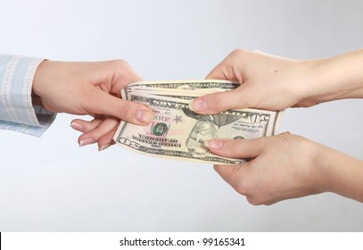 Hand Handing Over Money