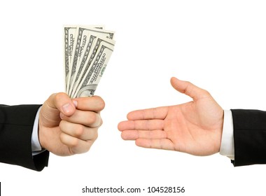 Hand Handing Over Money To Another Hand Isolated On White Background