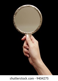 A hand and a Hand-mirror