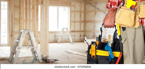 Hand Of Handyman With A Tool Bag.