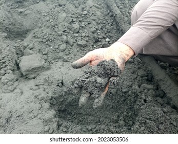 A Hand Having Sludge (coal ) In Grip   - Karachi Pakistan - Aug 2021