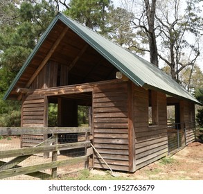 Hand Hewn Beams - Rural Structure Horse Barn; Interior Beams Were Fallen Logs Hewn Into Shape Using A Broad Axe; A Testament To The Settler Way Of Life