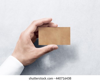 Hand Hold Blank Plain Kraft Business Card Design Mockup. Clear Calling Card Mock Up Template Holding Arm. Visit Pasteboard Craft Paper Display Front. Small Offset Texture Card Print. Business Identity