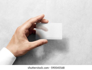 Hand hold blank translucent card mockup with rounded corners. Plain clear call-card mock up template holding arm. Plastic transparent acrylic namecard display front. - Shutterstock ID 590545568