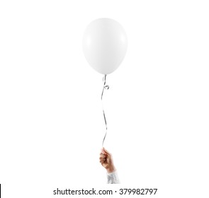 Hand hold blank white balloon mock up isolated. White balloon art design mockup holding in hand. Clear baloon template. Logo, texture, pattern presentation design element.