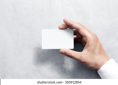 Hand hold blank white card mockup with rounded corners. Plain call-card mock up template holding arm. Plastic credit namecard display front. Check offset card design. Business branding. - Shutterstock ID 503912854
