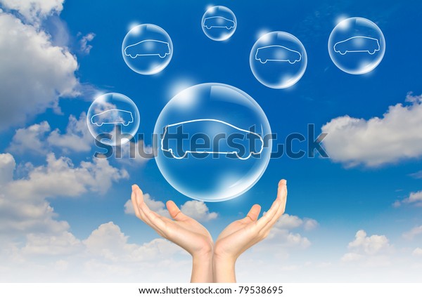 Hand hold Bubbles\
in the sky with car inside