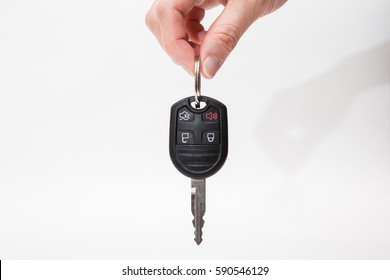 Hand Hold Car Key On White Backgrounds