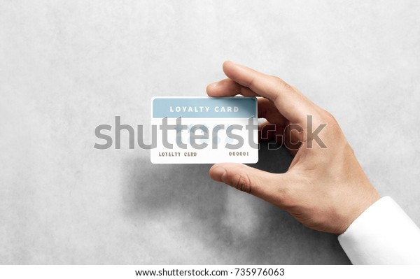 Hand hold discount card template with rounded\
corners. Plain reward namecard mock up holding arm. Plastic loyalty\
program mockup with points display. Gift offset card design. Loyal\
service branding.