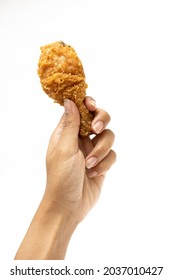 Hand hold fried calf chicken isolated on white background - Shutterstock ID 2037010427