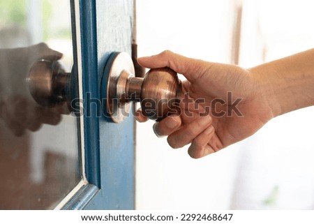 Similar – Image, Stock Photo Open front door of a Gründerzeit apartment building, doorbell signs, graffiti and shadows a