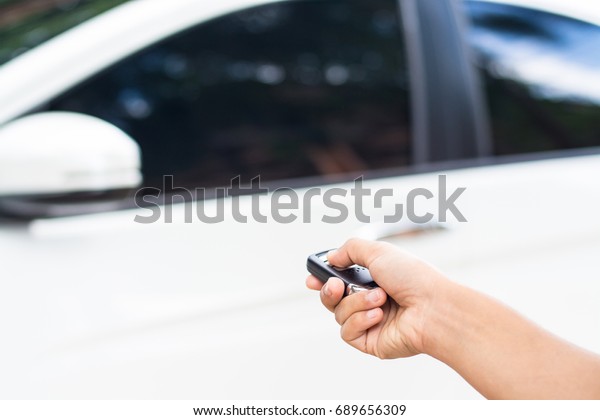 Hand hold key Opening car
door