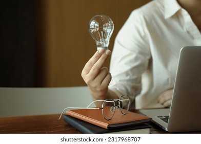 Hand hold light bulb  for good idea.