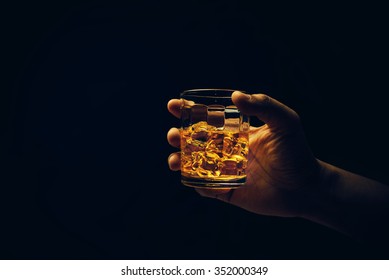 Hand Hold Mug Of Scotch Whisky.