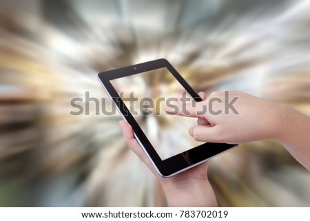 hand hold smartphone with abstract blur background