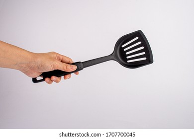 Hand Hold Of Spatula. Isolated On A White Background 