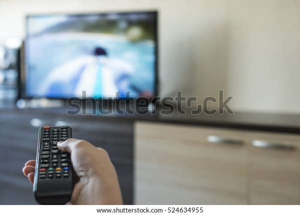 Hand Hold Tv Remote Control Tv Stock Photo (Edit Now) 524634955