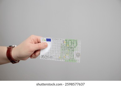 A hand holding a 100 euro bill made of binary code - Powered by Shutterstock - Get 15% off with code: PIKWIZARD15