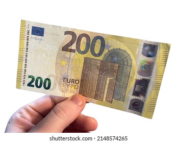 Hand holding a 200 euro banknote. White background.
