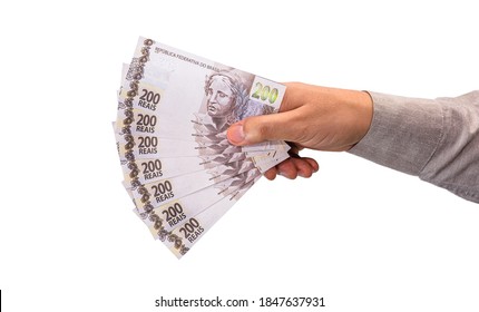 Hand Holding 200 Reais Bills, Concept Of Brazil Economy, Inflation, Financial Crisis Or Loss