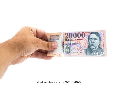 Hand Holding 20000 Forint Banknote Isolated On White