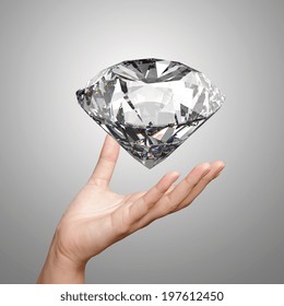 Hand Holding 3d Diamond Over White Background 