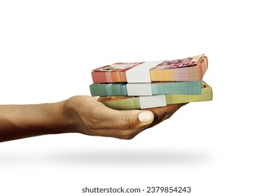 Hand Holding 3D rendering of stacks of Ghanaian cedi notes isolated on white background