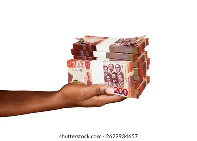 Hand Holding 3D rendering of stacks of 200 Ghanaian cedi notes isolated on white background