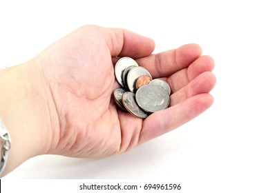 Hand Holding American Coins (quarter, Nickel, Dime, Penny) - Isolated White Background