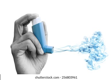 Hand Holding Asthma Inhaler With Smoke