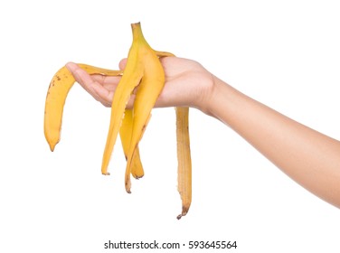 Hand Holding Banana Peel Isolated On White Background