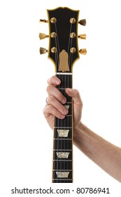 Hand Holding A Bass Guitar Neck Isolated