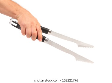 Hand Holding Bbq Tongs.