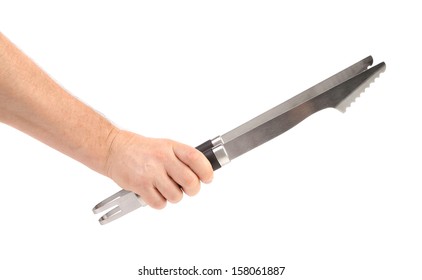 Hand Holding Bbq Tongs. Isolated On A White Background