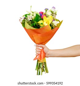 Hand Holding A Beautiful Bouquet Of Different Flowers. Isolated On A White Background