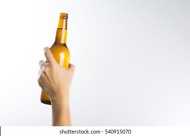 Hand Holding A Beer Bottle Without Label Isolated On White Background