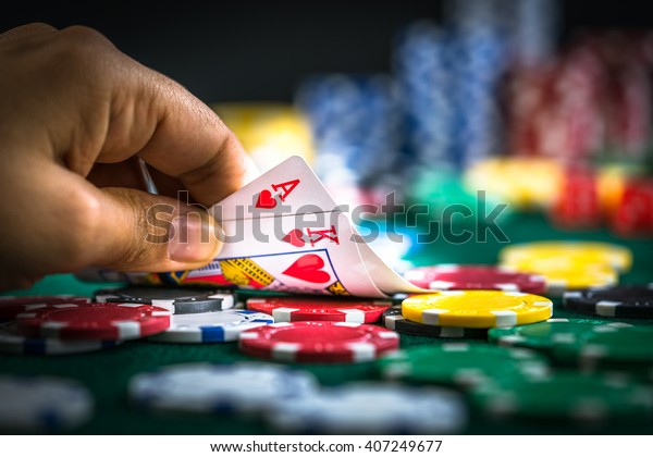 Hand Holding\
Best Deal Game Cards and Money\
Chips