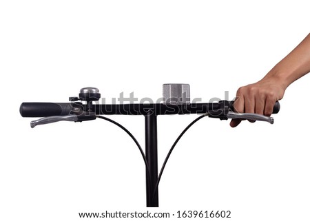 Hand holding Bicycle handlebar with bell, brake, reflector light,isolated on white background.front view of bicycle 
