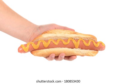 Hand Holding Big Hot Dog. Isolated On A White Background.