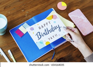 Hand Holding Birthday Wishing Card