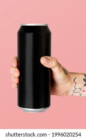 Hand Holding A Black Aluminum Can