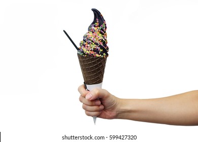 A Hand Holding Black Frozen Yogurt Charcoal Or Soft Serve Ice Cream In Cone  Isolated On White Background, Premium Milk Low Fat Yogurt, Copy Space