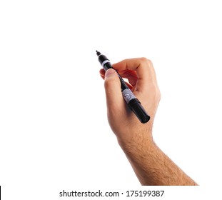 Hand Holding A Black Marker Isolated On White With Copy Space.