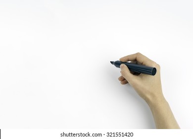 Hand holding a black marker isolated on white copy space
